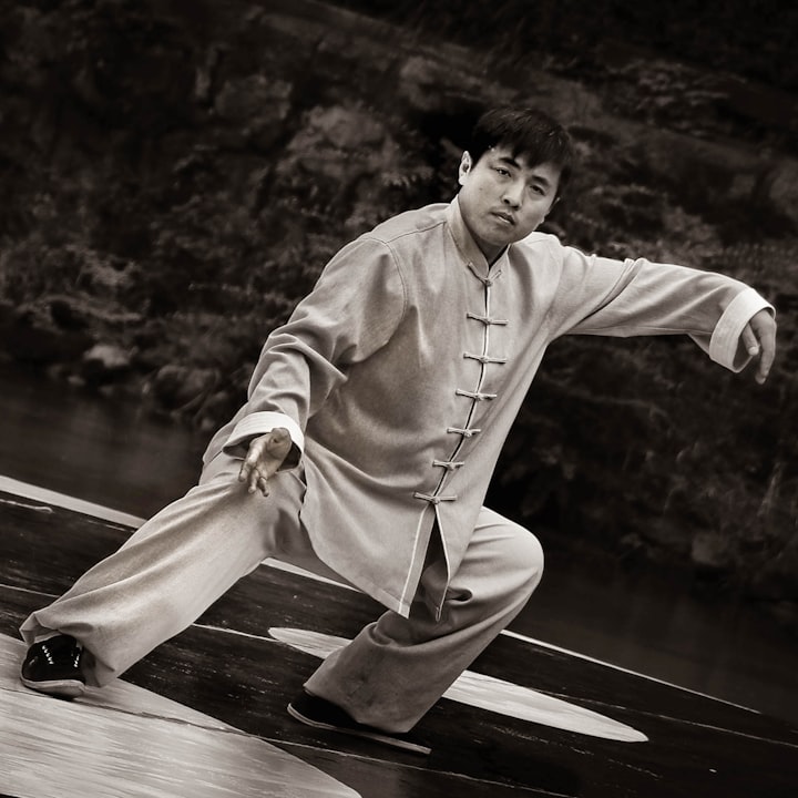A Tai Chi practitioner mid-posture (stock placeholder)